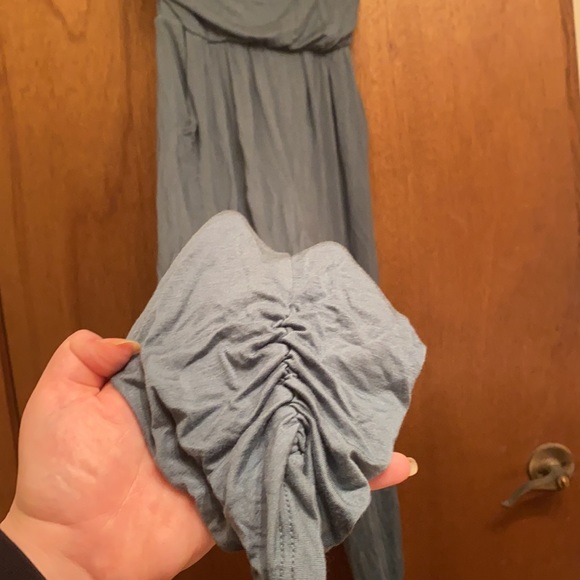 Teal colored romper with pockets and ruffled by feet to go with shoes - Picture 2 of 4